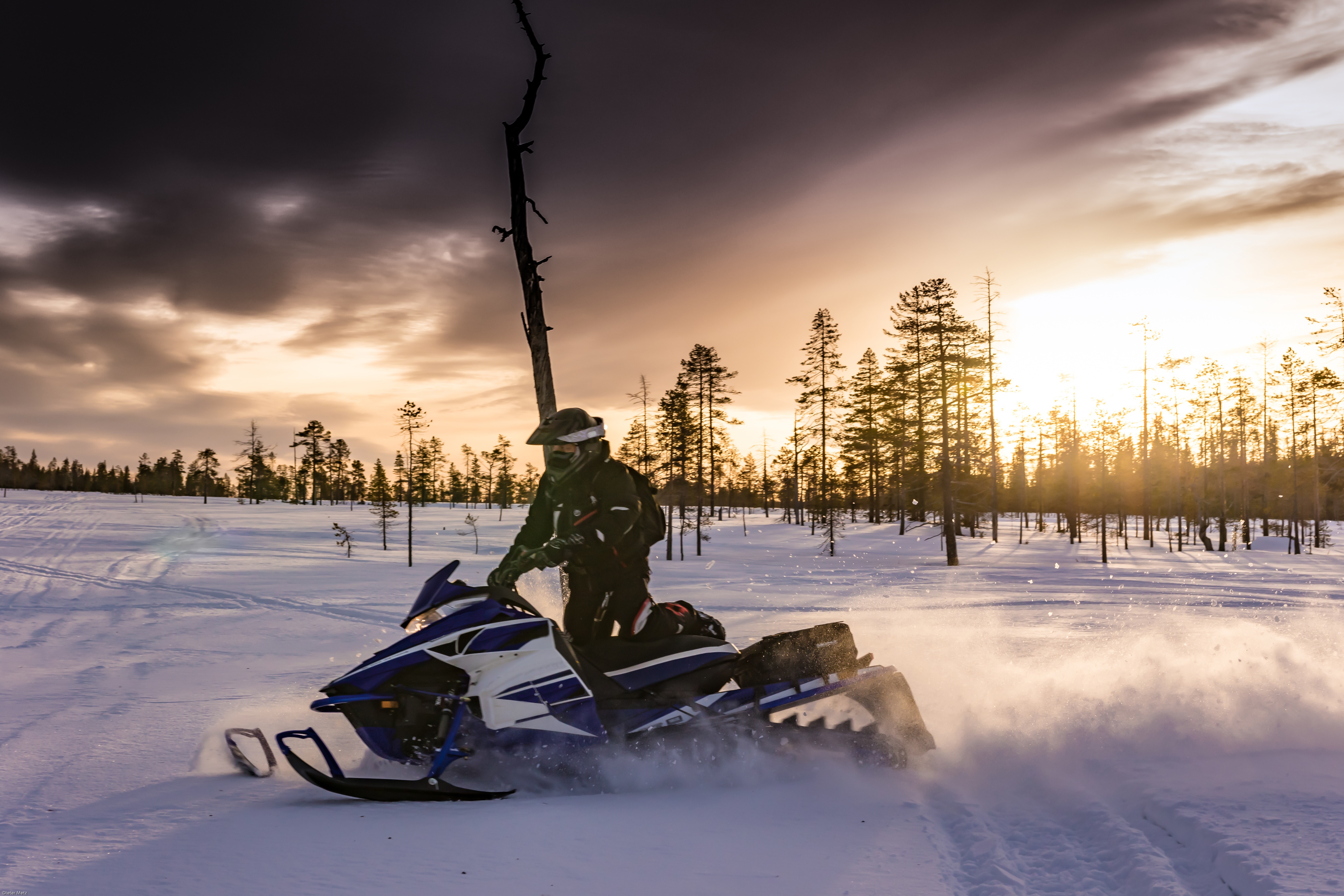 Sleds lined up at a checkpoint during the annual poker run.